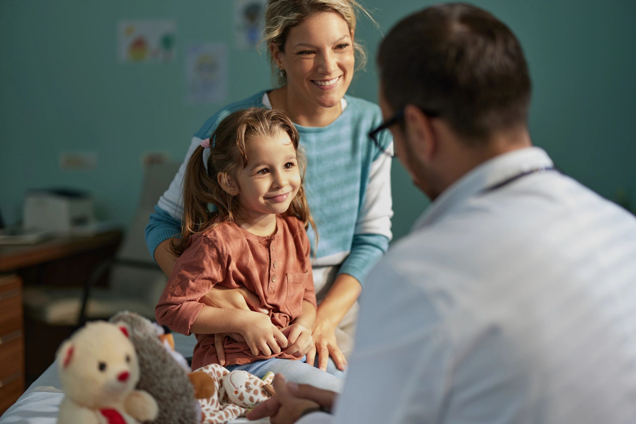 Parent and child in a clinic waiting area