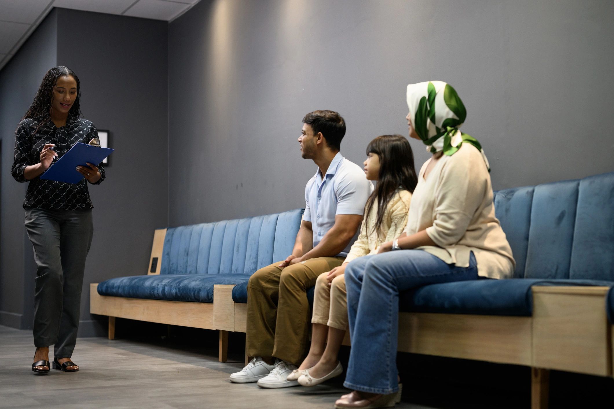 Family waiting in a hospital clinic waiting room